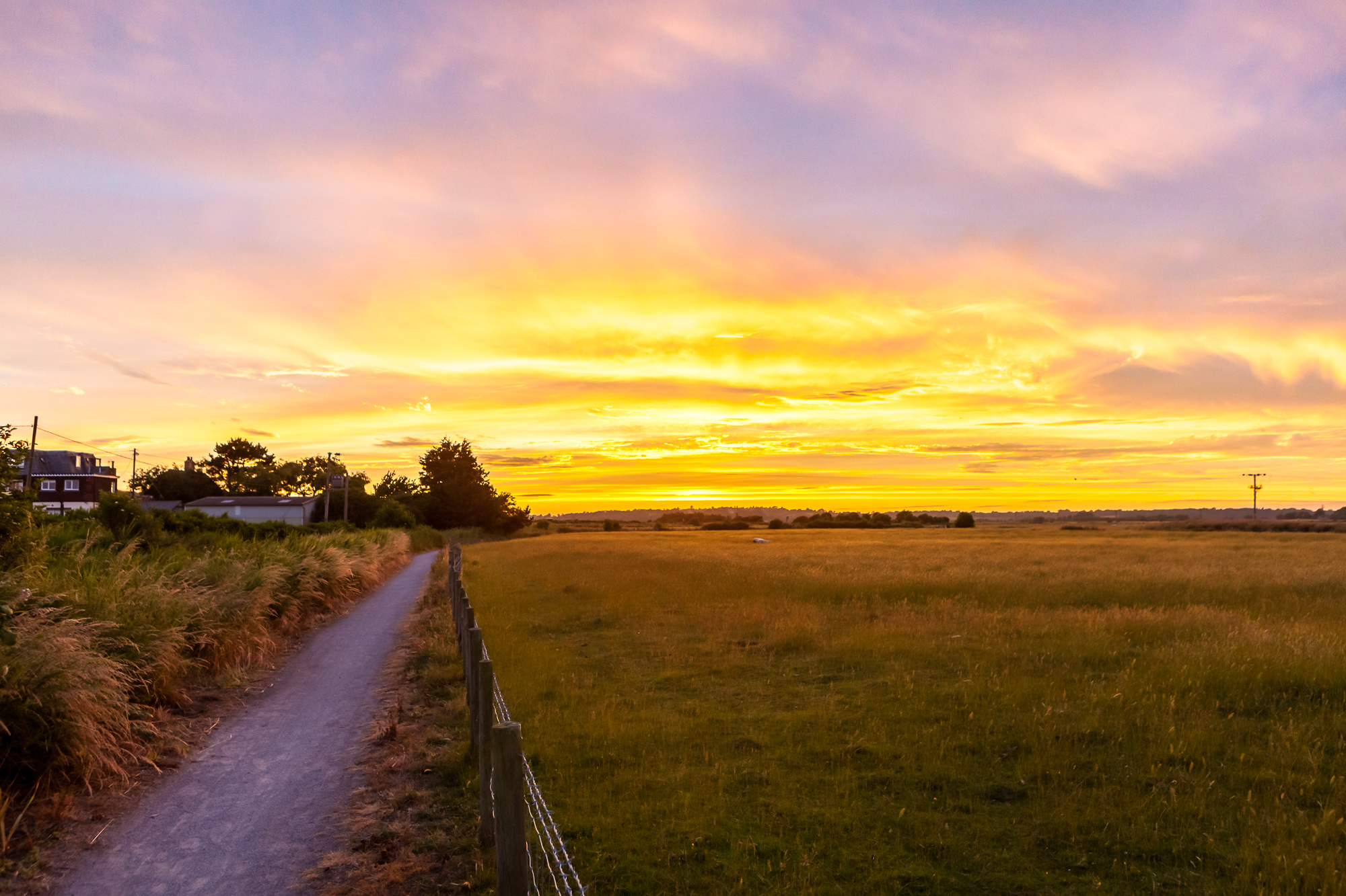 A photo of sundown in the English countryside.