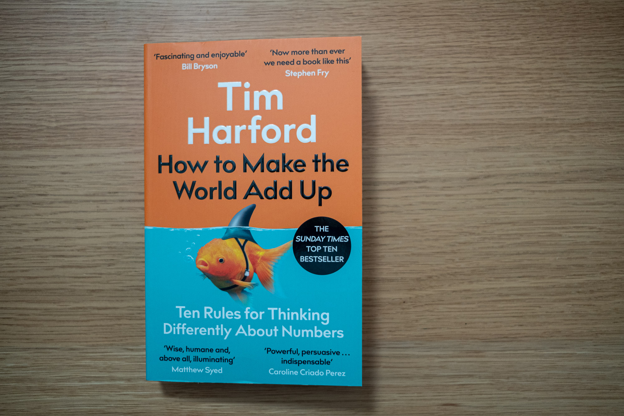 The cover of how to make the world add up by Tim Harford